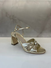 Sandales dorées à talon bloc – Nœud glamour & éclat doré